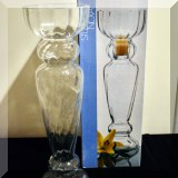 G24. One of four, new in box Studio Nova glass candleholders/vases. 